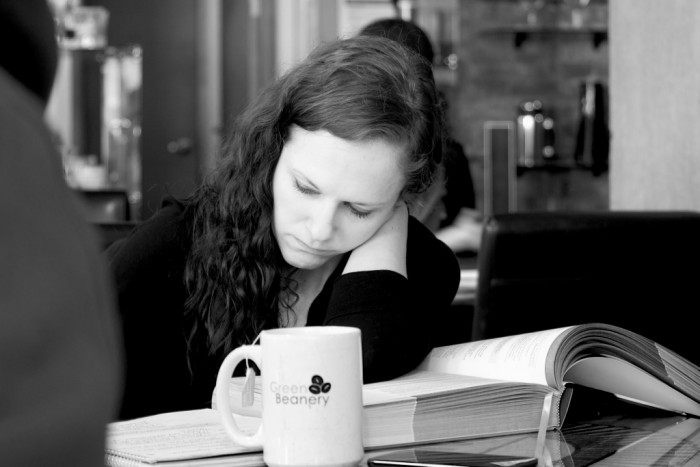 Random customer studying while enjoying a tea at the Green Beanery.
